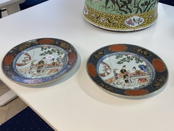 A pair of Chinese famille rose plates with ladies playing music, Yongzheng