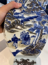 A Chinese blue, white and copper-red 'mountainous landscape' vase, 19th C.