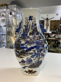 A Chinese blue, white and copper-red 'mountainous landscape' vase, 19th C.