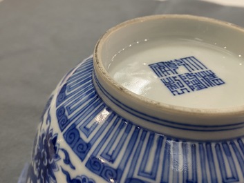 A pair of Chinese blue and white 'wan shou wu jiang' bowls, Qianlong mark and of the period