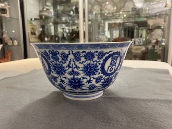 A pair of Chinese blue and white 'wan shou wu jiang' bowls, Qianlong mark and of the period