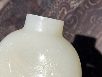 A Chinese white jade 'Eight horses of Mu Wang' snuff bottle, 18/19th C.