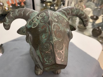 A Chinese ram-shaped silver-inlaid bronze 'xizun' vessel, Ming