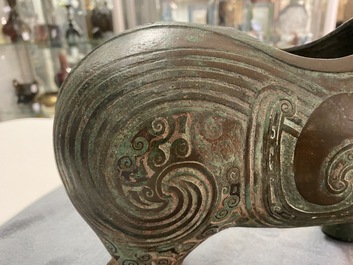 A Chinese ram-shaped silver-inlaid bronze 'xizun' vessel, Ming