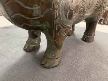 A Chinese ram-shaped silver-inlaid bronze 'xizun' vessel, Ming