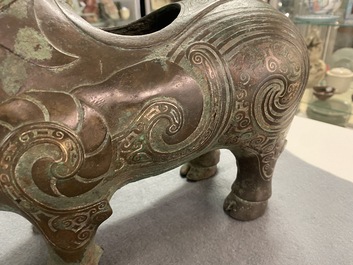 A Chinese ram-shaped silver-inlaid bronze 'xizun' vessel, Ming