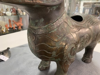 A Chinese ram-shaped silver-inlaid bronze 'xizun' vessel, Ming