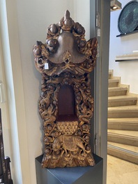 A large Chinese gilded and lacquered wooden reticulated Buddhist shrine, 17/18th C.