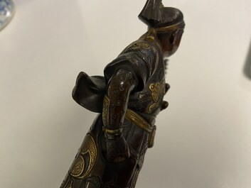 A Japanese patinated and gilded bronze figure of a warrior, signed Miyao, Meiji, 19th C.