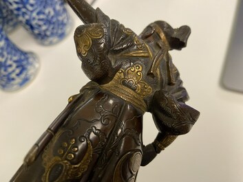 A Japanese patinated and gilded bronze figure of a warrior, signed Miyao, Meiji, 19th C.