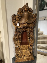 A large Chinese gilded and lacquered wooden reticulated Buddhist shrine, 17/18th C.