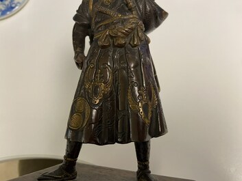 A Japanese patinated and gilded bronze figure of a warrior, signed Miyao, Meiji, 19th C.