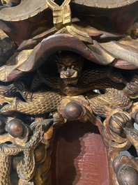 A large Chinese gilded and lacquered wooden reticulated Buddhist shrine, 17/18th C.