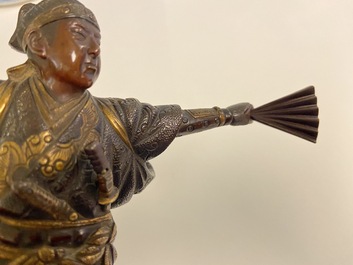 A Japanese patinated and gilded bronze figure of a warrior, signed Miyao, Meiji, 19th C.