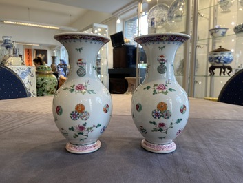 A pair of Chinese famille rose vases, Yongzheng mark, 19/20th C.