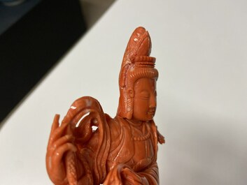 A Chinese carved red coral 'Tara' figure, 19/20th C.