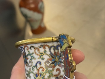 A Chinese cloisonn&eacute; two-handled 'lotus scroll' cup on stand, 18/19th C.