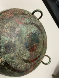 A Chinese bronze ritual tripod 'dui' food vessel and cover, Eastern Zhou