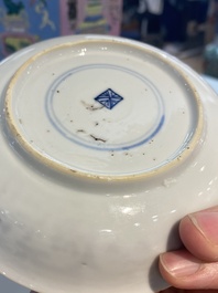 A Chinese blue and white covered cup and saucer for the French market, Kangxi