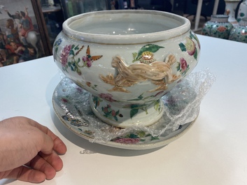 A Chinese Canton famille rose 'butterflies' tureen and cover on stand, 19th C.