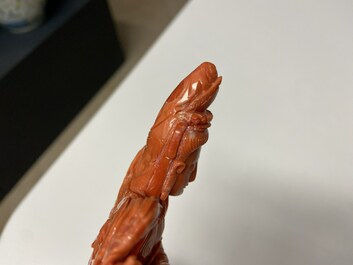 A Chinese carved red coral 'Tara' figure, 19/20th C.