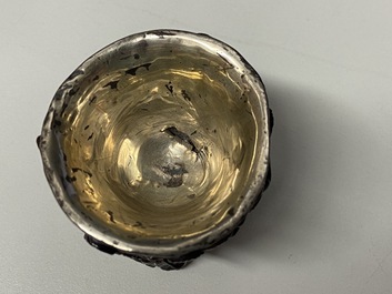 A pair of Chinese silver-lined coconut wine cups, Ming
