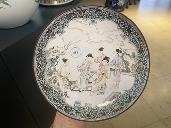 A Chinese 'ruby back' Canton enamel 'musicians' plate, Yongzheng