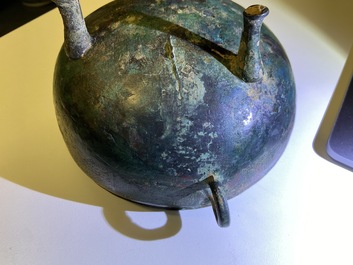 A Chinese bronze ritual tripod 'dui' food vessel and cover, Eastern Zhou