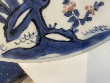 A Chinese blue, white and copper-red ko-sometsuke 'pagoda' plate for the Japanese market, Transitional period