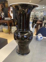 A Chinese monochrome black 'yenyen' vase with traces of gilding, Kangxi
