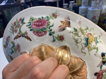 A Chinese Canton famille rose 'butterflies' tureen and cover on stand, 19th C.