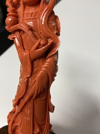A Chinese carved red coral 'Guanyin' figure, 19/20th C.