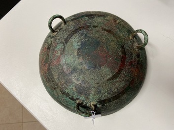 A Chinese bronze ritual tripod 'dui' food vessel and cover, Eastern Zhou