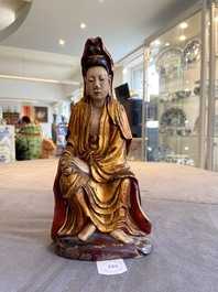 A Vietnamese gilded, lacquered and painted wooden figure of Guanyin, 18/19th C.