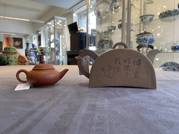 Two Chinese Yixing stoneware teapots with engraved inscriptions, 20th C.