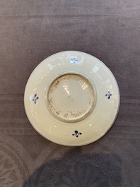 A Chinese blue, white and copper-red ko-sometsuke 'pagoda' plate for the Japanese market, Transitional period