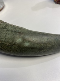 A Vietnamese bronze 'Oliphant' horn or rhyton, L&ecirc; or Mạc dynasty, 15/16th C.