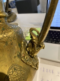 A Tibetan brass ewer, an alms bowl and an Indian bronze ewer, 18/19th C.