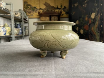 A Chinese Yaozhou celadon tripod censer, Song or later