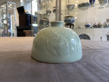 A Chinese celadon-glazed water pot, Kangxi mark, 19th C.