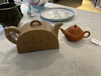 Two Chinese Yixing stoneware teapots with engraved inscriptions, 20th C.