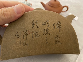 Two Chinese Yixing stoneware teapots with engraved inscriptions, 20th C.