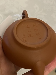 Two Chinese Yixing stoneware teapots with engraved inscriptions, 20th C.