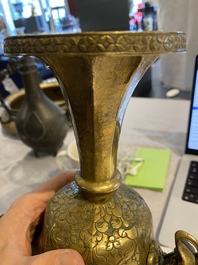 A Tibetan brass ewer, an alms bowl and an Indian bronze ewer, 18/19th C.