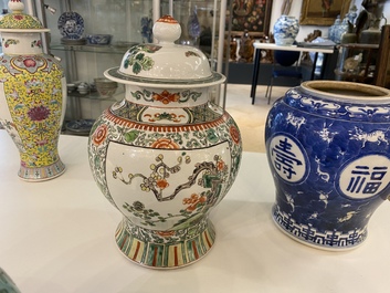 Four various Chinese famille rose, verte and blue and white vases, 19/20th C.