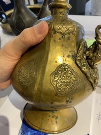 A Tibetan brass ewer, an alms bowl and an Indian bronze ewer, 18/19th C.