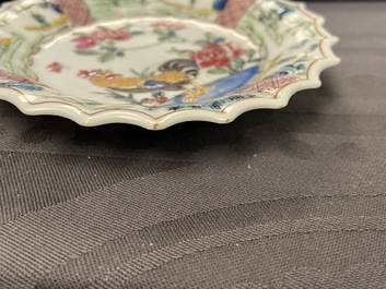 A lobed Chinese gilded famille rose 'lotus' cup and saucer and one depicting roosters, Yongzheng/Qianlong