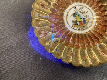 A lobed Chinese gilded famille rose 'lotus' cup and saucer and one depicting roosters, Yongzheng/Qianlong