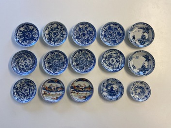 Twenty-seven Chinese blue and white saucers and seven cups, Kangxi and later