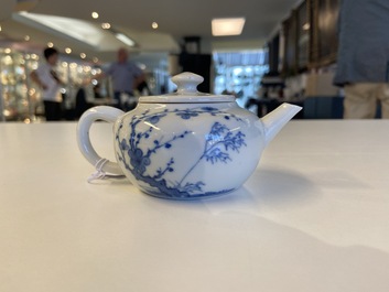 A small Chinese blue and white teapot with floral design, 19th C.